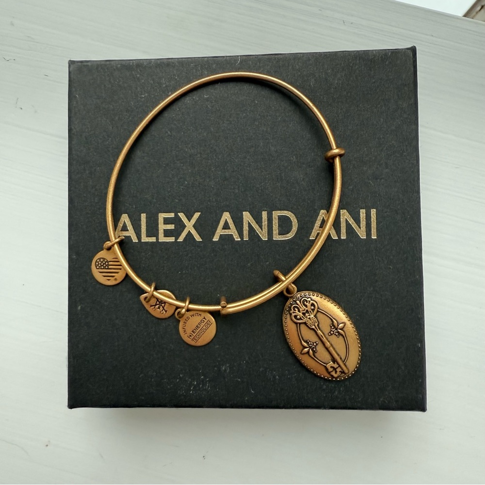 Alex and Ani Gold Tone Adjustable Bangle with Key to Life Charm
